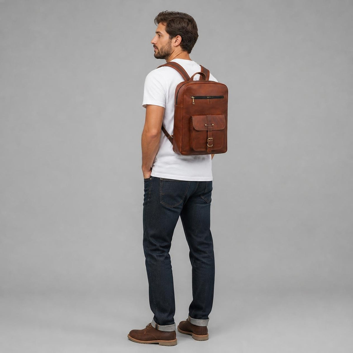DEKVIO 18 inch leather backpack shown at true size on a man, full length