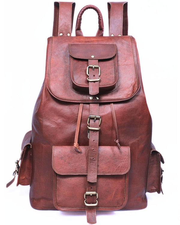 DEKVIO 20 inch brown full-grain leather backpack, front view with push-lock flap and brass buckles