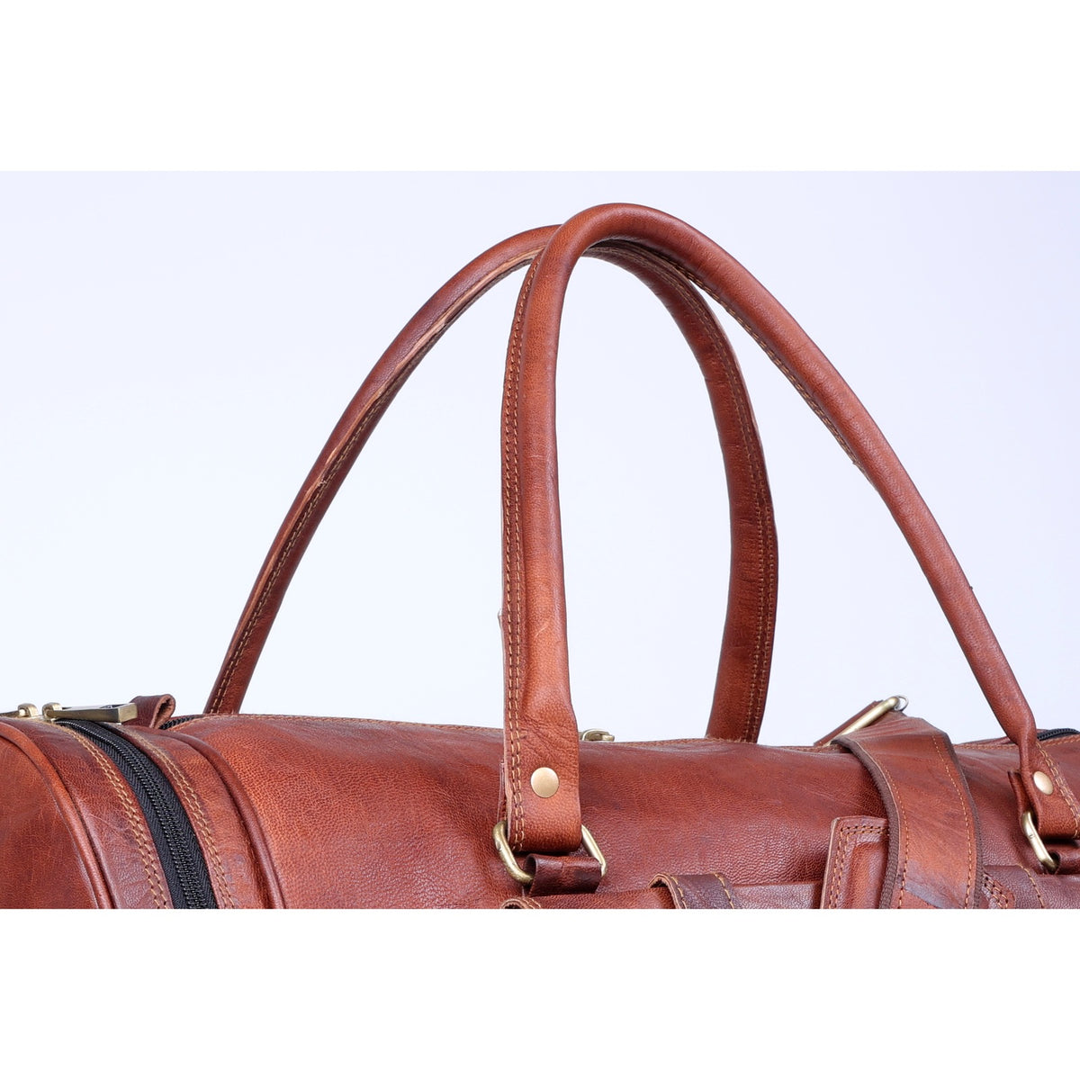 DEKVIO leather gym duffle — reinforced leather handles and stitching detail