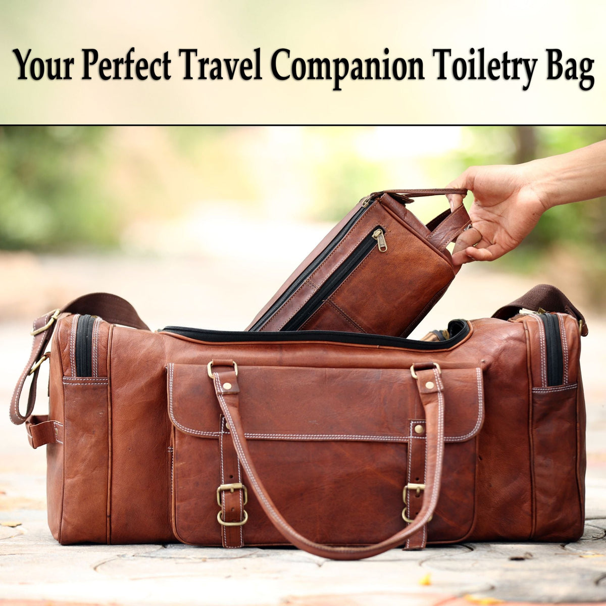 Leather dopp kit packed alongside the 24" leather duffle bag