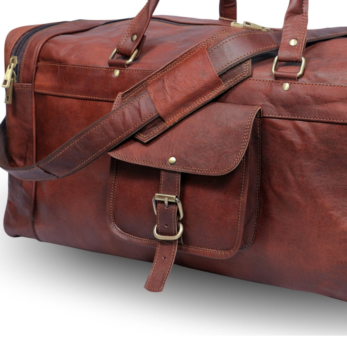 Close-up of DEKVIO leather duffle antique brass buckle and precision stitching