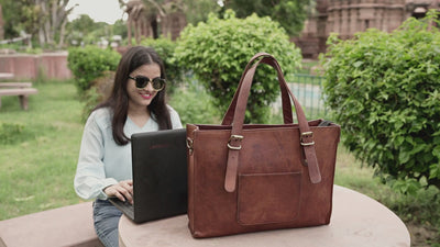 DEKVIO 15.6 inch leather laptop tote work bag with trolley sleeve — product video